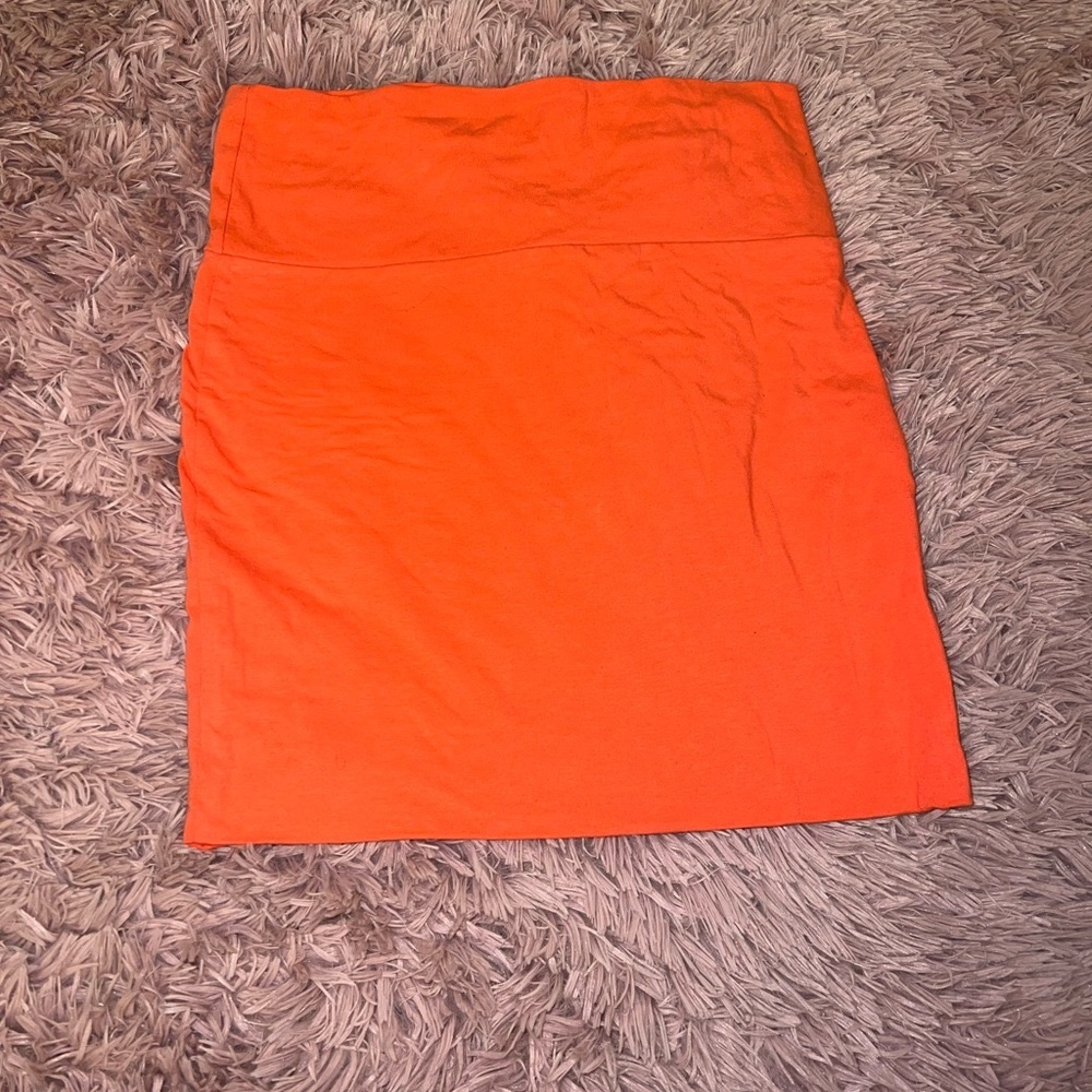 Never been worn! Cute coral mini skirt! Stretchy!